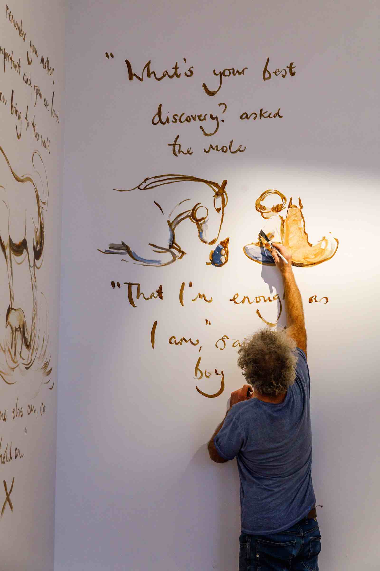 Charlie Mackesy at work in the Sotheby's Story Café