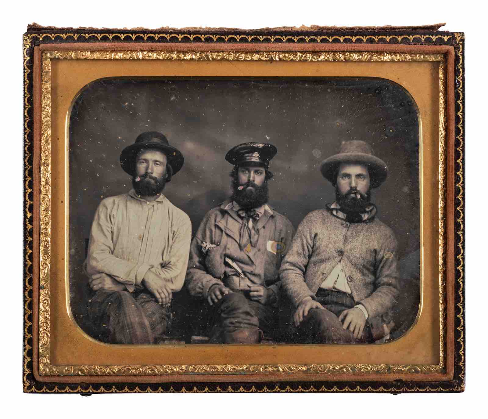 A half plate daguerreotype of three gold miners