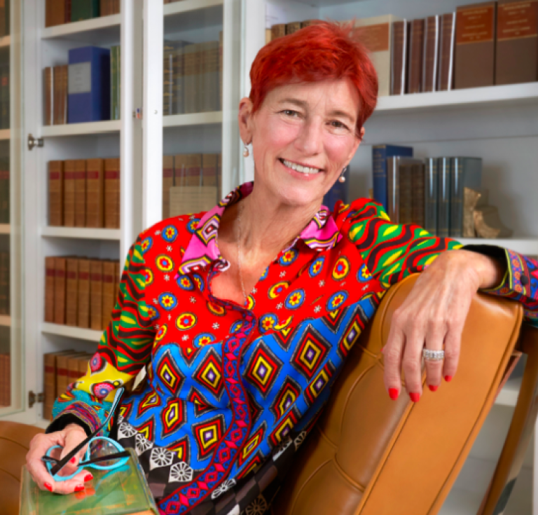 Bev Rogers with her books